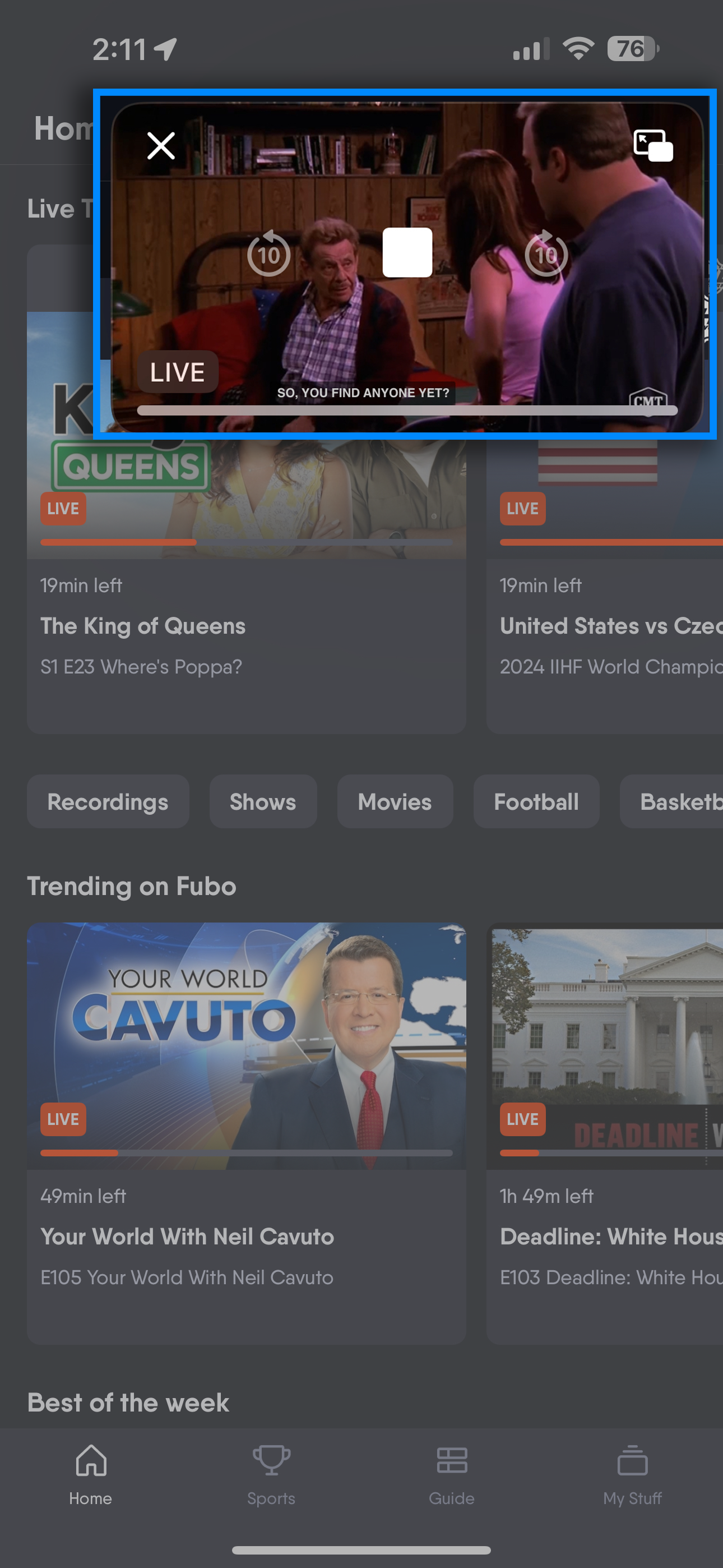 With the mini-player open, you can browse different screens for the FuboTV iOS app to find a different program