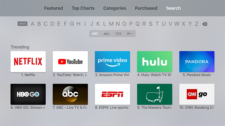 Apple TV App Store search screen with on-screen keyboard shown
