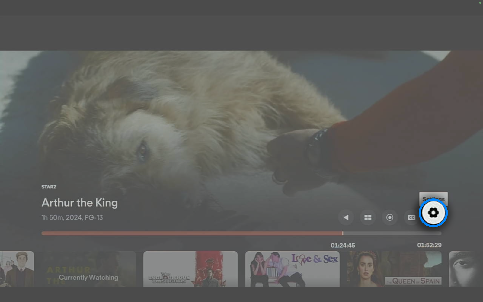 El ícono de configuración en los controles del reproductor de la app Fubo